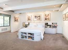 Master bedroom in luxury mansion. 24 Jane Fonda Beverly Hills Mansion Bedroom With Shelving At End Of Bed House Home