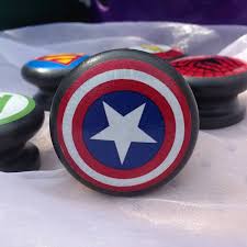 And thanks to the creativity of some of the uk's best small businesses, it's led to a reimagining of the door as we know it. Superhero Logo Door Drawer Cupboard Knob By Surface Candy Notonthehighstreet Com