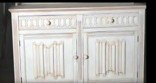 Iron in an antique nickel finish with glass front doors. How To Paint Kitchen Cabinets To Look Antique Designing Idea