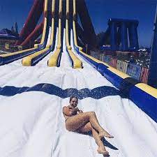 The Big Wedgie World S Tallest Inflatable Waterslide Inflatable Water Park Water Park School Holidays