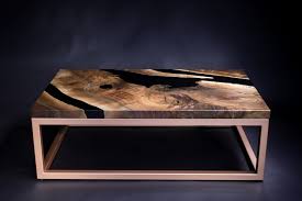 Coffee table made out of walnut tree with coffee beans insertions in epoxy resin. Copper Creek Resin Table Blacktail Studio