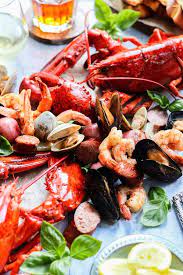 Easy Summer Kitchen Clambake Easily Create Your Own One Pot Seafood Feast Right In Your Easy Seafood Recipes Healthy Easy Seafood Recipes Easy Dinner Recipes