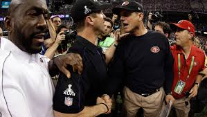 John Harbaugh gets best, barely, of little brother Jim