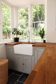 Gray Kitchen Cabinets With Butcher Block Countertops And White Sink With Images Kitchen Inspirations Kitchen Design Home Kitchens