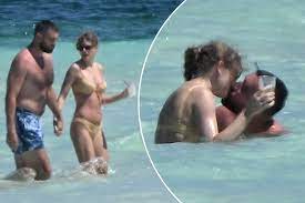 Taylor Swift and Travis Kelce seen kissing in bathing suits during Bahamas vacation