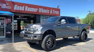 Black And Blue Tis Wheels 2016 Ford F 150 22x12 Tis 544mb Gloss Black Machine Face 35x13 50 22 Fury Country Hunter Mt Get In 2020 Road Runner Wheels And Tires Wheel And Tire Packages