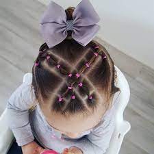 Selena S Hairstyles On Instagram Crossed Elastics And A Lovely Big Bow Thanks To Ribbonsbowuk Hair Dos For Kids Kids Curly Hairstyles Girl Hair Dos