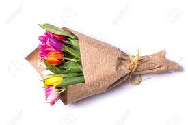 Our bouquets are not that costly, coz currently, we take local orders only(of bouquets). Bouquet Of Spring Tulips Flowers Wrapped In Paper Isolated On Stock Photo Picture And Royalty Free Image Image 55587304