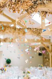 Colourful Paper Cranes Sunflower Wedding Decor In Rustic Barn Rock My Wedding Sunflower Wedding Decorations Sunflower Wedding Paper Crane Wedding