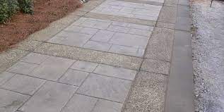 Unlike concrete pavers, stamped concrete is poured and not made from individual paving stones. Stamped Concrete Mimics Flagstone Landscaping Network