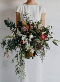 This Wild Wedding Bouquet Is The Perfect Way To Create An Impact This Large Bouquet Uses Trailing Flower Bouquet Wedding Wild Wedding Bouquet Wedding Flowers