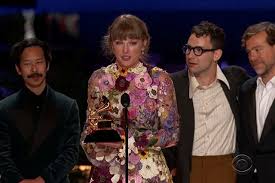 An excerpt of each review is provided along with a hyperlink to the source. Taylor Swift S Folklore Wins Album Of The Year At Grammys