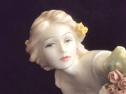 Original United Kingdom Art Pottery Figurines for sale