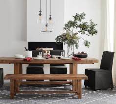 The power of nostalgia has compelled pottery barn to curate a kitschy collection of friends items for your home, which, besides eternally celebrating our beloved sextet, was created to ring in the show's 25th (!) anniversary this fall. Perfect Pair Reed Extending Dining Table With Reed Bench Carissa Chair Pottery Barn