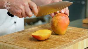 Hold the mango so it is standing up on the cutting board. How To Cut A Mango Great British Chefs