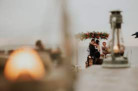 Plants or leaves may be available. Montauk New York Wedding Photographer Navy Beach Wedding