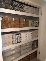 leanne marie the linen cupboard woven storage basket from kmart linen cloth storage baskets with home organisation home organization linen closet organization