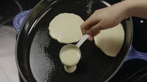 Start with 1 1/4 cups milk, adding up to another 1/4 cup if necessary, as you mix it with the flour. How To Make Easy Homemade Pancakes Allrecipes Com Youtube
