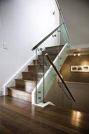 Sleek Maple Stairs With Glass Railing And Stainless Steel Handrail Glass Staircase Railing Glass Railing Stairs Metal Stair Railing