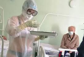 On the latter is a red logo. Russian Nurse Disciplined For Showing Bikini Outfit Under See Through Ppe In Male Only Covid 19 Ward