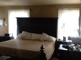 For example, warm reds and yellows are great colors for the master bedroom. Headboard Between Two Windows Pasteurinstituteindia Com
