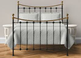 A metal headboard and footboard in antique bronze. Wrought Iron Emily Bed Victorian Styled Reinforced Beds