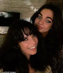 Jenny Powell looks chic in a grey blazer as she steps out with her  lookalike daughter Constance, 23