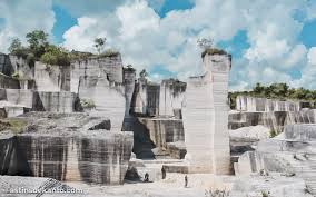 The trail to bukit batu putih can be accessed from the tanjung tuan recreational forest entrance gate, which is very easy to find on google maps or waze. Terpukau Keindahan Bukit Kapur Batu Putih Sumenep Astin Soekanto