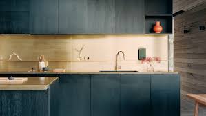Sleek and modern shelves in the background make it easy to store all and sundry. Modern Kitchen Ideas Livingetc