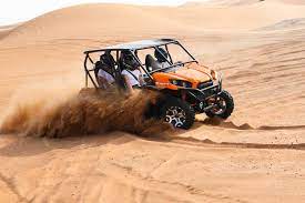 Then, grab your helmets and safety goggles and get behind the wheel of our desert fox dune buggy. Dubai Self Drive Dune Buggy And Camel Ride Adventure Getyourguide