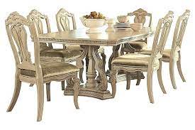 The Ortanique Dining Table From Ashley Furniture Homestore Afhs Com With The Rich Old World Beauty Of Serpentine Flo Furniture Ashley Furniture Dining Decor