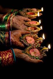 Women Holding Decorated Earthen Lamps At Diwali In 2020 Diwali Photography Festival Lights Diwali