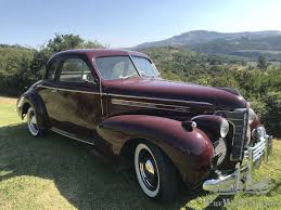 Image result for Trojan Maroon 1939 Oldsmobile