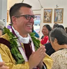Father Larry Dennis III celebrates first Mass at St. Joseph Catholic Church