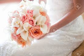 Please confirm whether it is the size you need before purchase. Bride With Beautiful Orange And Pink Wedding Bouquet Of Flowers Stock Photo Picture And Royalty Free Image Image 44242014