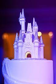 Complete Your Fairy Tale Wedding Reception With A Cinderella Castle Inspired Cake Topper Disneyland Wedding Disney Wedding Cake Disney Wedding