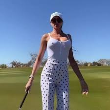 Holly Sonders nipples poke eyes out as Oscar De La Hoyas busty WAG hits  golf course - Daily Star