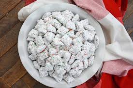 8 cups rice or corn cereal squares 1/2 cup peanut butter 1 bag of milk chocolate chips or semi sweet 3/4 cup powdered sugar 3/4 cup brownie mix(dry) add ins. Christmas Puppy Chow