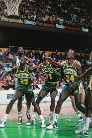 Olden Polynice Derrick Mckey And Xavier Mcdaniel Look To Rebound Against The Boston Celtics During A 1988 Game Mcda Seattle Sports Xavier Mcdaniel Nba Stars