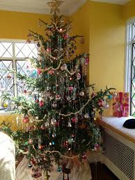 Live Christmas Tree Decorated With Vintage Style Ornaments Garland Lights And Tinsel Vintage Christmas Tree Live Christmas Trees Vintage Christmas