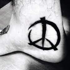People are found to having a tattoo based on their spiritual beliefs, and it also comes when they are suggesting or advising for a tattoo to others. Top 71 Peace Sign Tattoo Ideas 2021 Inspiration Guide Peace Sign Tattoos Tattoos For Guys Peace Tattoos