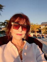 Dan Thorington and Marjorie Merena install their work for “Layers,” the new  show at the Adamant Co-op.