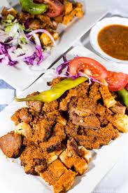 Lamb and chicken on a bed of toasted pita, served with an eggplant sauce $ 22 $ 22 seafood kebab. Halep Sauce Wiki