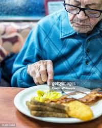 274 Man Eating Bacon Stock Photos, High-Res Pictures, and Images