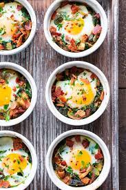 Made In Single Serving Ramekins These Baked Eggs Are Packed With Savory Goodies And Flavor Great For W Baked Eggs Breakfast Recipes Bacon Stuffed Mushrooms
