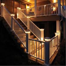 Consult your local building codes for guard and handrail requirements. Azek Premier Rail In White With Post Cap Lights Under Rail Lights And Riser Lights The Decking Featured Is Aze Building A Deck Hardwood Decking Deck Lighting