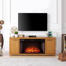 One needs to understand what size fits their room best, how much power if you have been looking for an electric fireplace tv stand with an entertainment center then this is the model for you. Oak Entertainment Center With Fireplace
