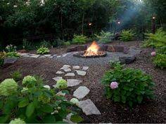 This one is made just for cooking and will likely come with a grill that can fit right above the firewood. 9 Wood Chip Patio Ideas Patio Backyard Landscaping Backyard