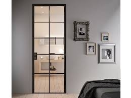 Choosing white doors with glass adds a contemporary look without compromising on style. Industrial Style Doors Archiproducts