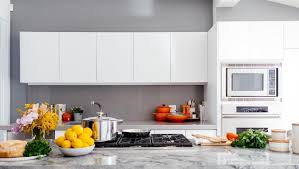 how to clean kitchen cabinets maid